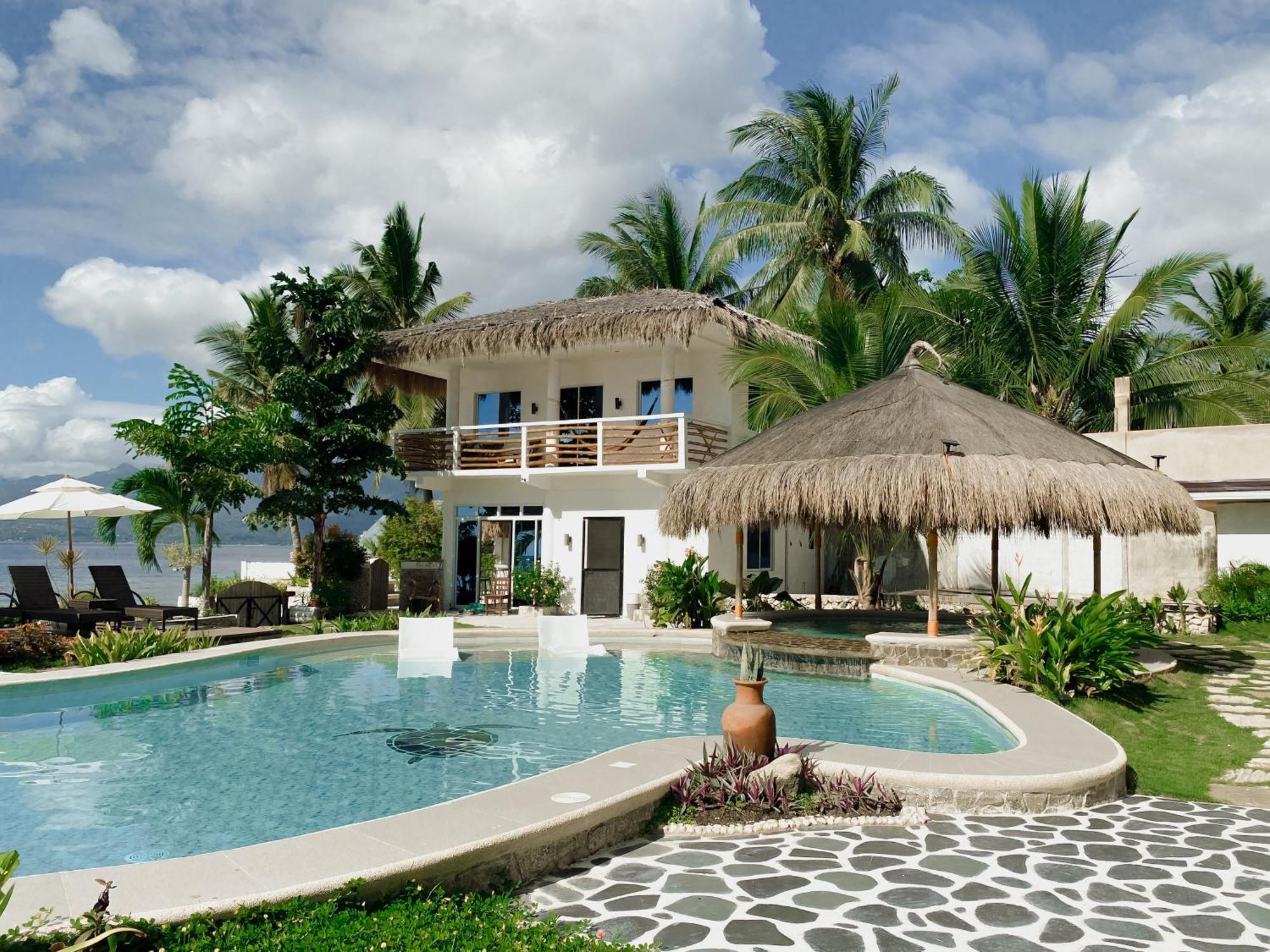 Avila'S Horizon Dive Resort Santander Exterior photo